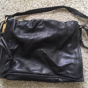 Bottega Veneta vintage leather handbag with strap.